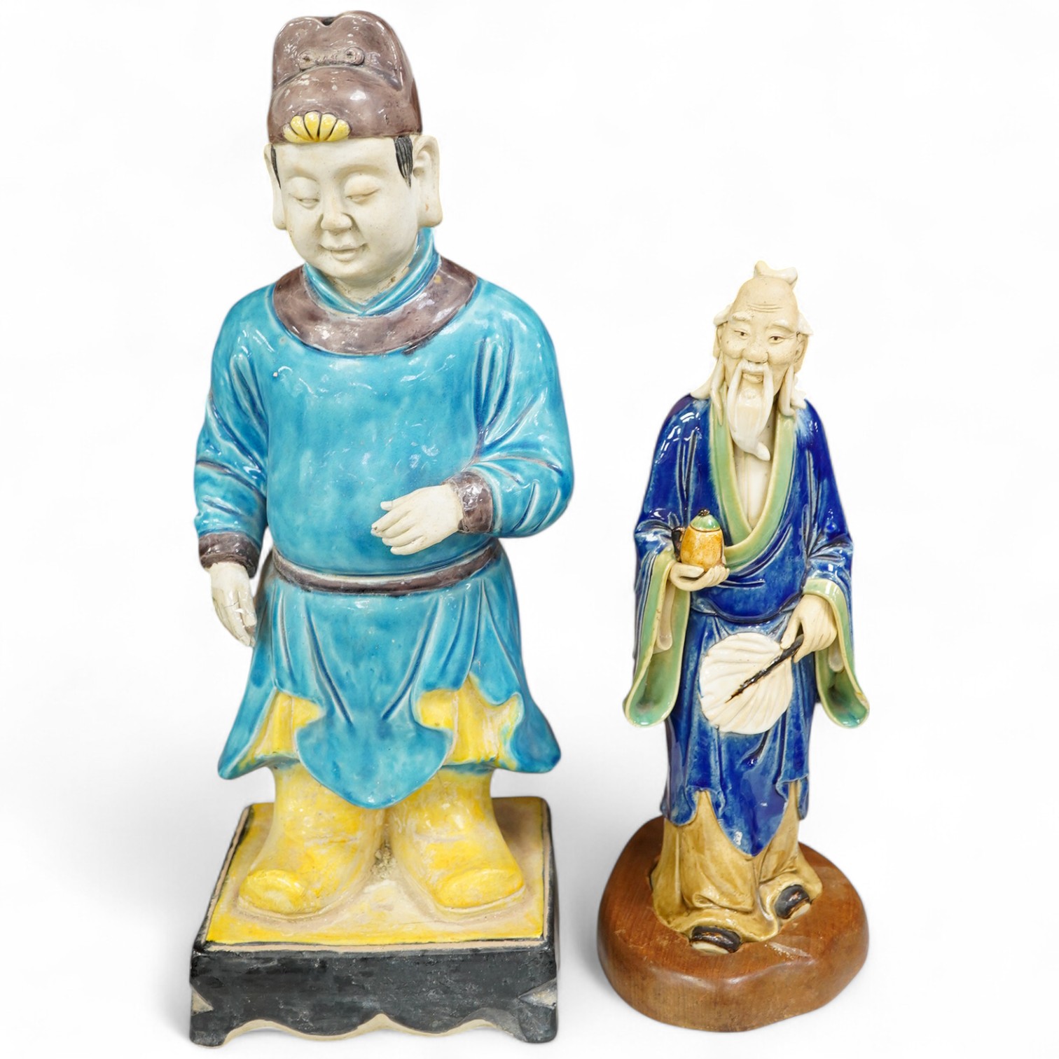 Two Chinese pottery glazed figures to include a Shiwan mudman, largest 48cm high